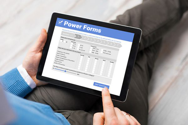 tablet computer in hands displaying Power Forms screen