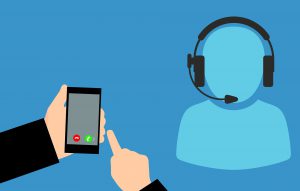 animation-call center agent depiction and hands on a cell phone