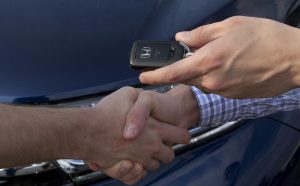 Handshake over car keys